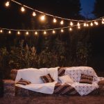 Photozone with a sofa from a hay on a night wedding